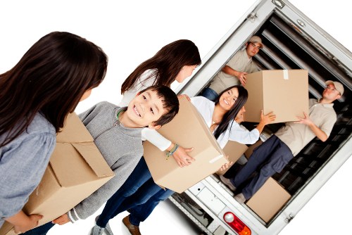 Removal company staff handling a customer complaint professionally