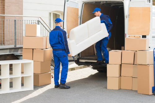 Professional office relocation planning in Uxbridge with business equipment ready for transport