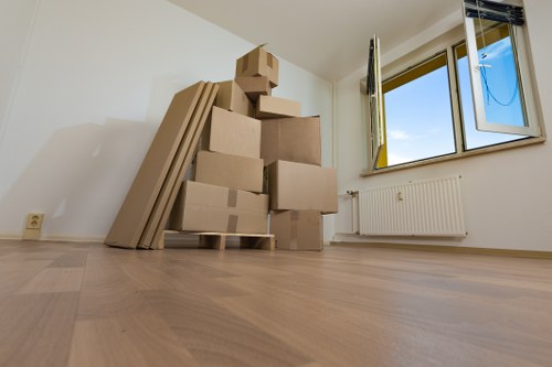 Organised moving boxes stacked for a house relocation in Uxbridge
