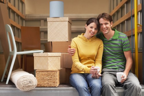 Professional moving team organizing boxes in Uxbridge