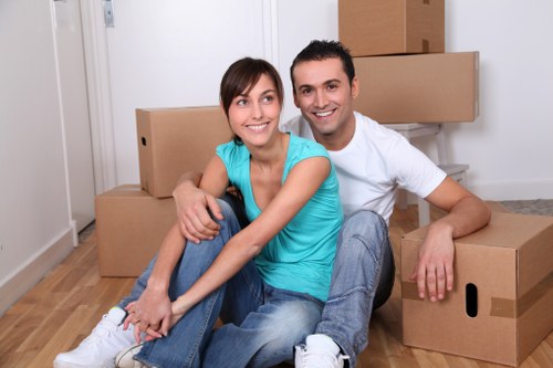 Professional movers packing household items in Uxbridge