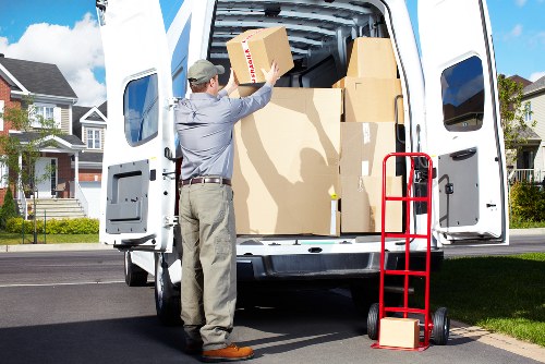 Professional movers handling commercial equipment in Uxbridge