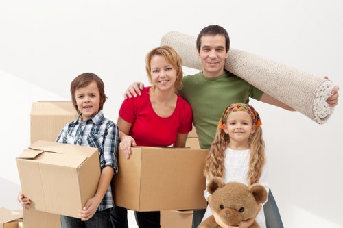 Packed office furniture and equipment ready for a business move