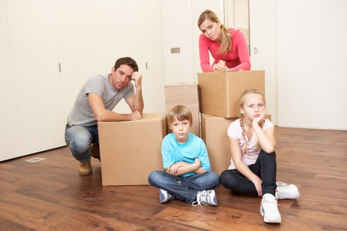 Packed boxes and furniture ready for transport