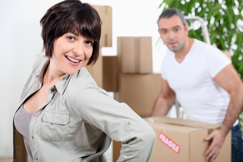 Professional house removals team preparing items for transport in Uxbridge