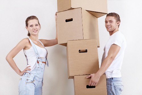 Office team preparing workspace layout during a business relocation in Uxbridge