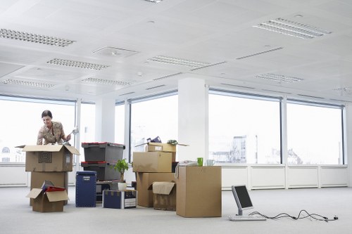 Preparing boxes and furniture for a moving truck in Uxbridge