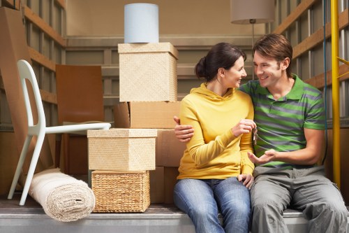 Team handling furniture during a house move